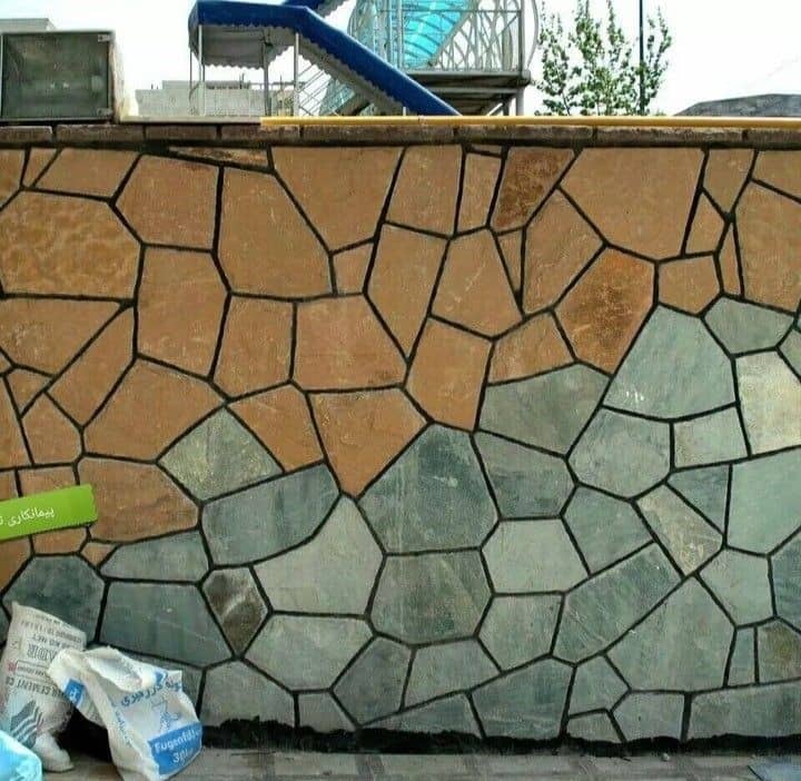 جذابترین سنگ لاشه موج دار برای نمای دیوار زیبا و دیدنی پیمانکار تاسیسات ساختمان ویلایی نادری 
